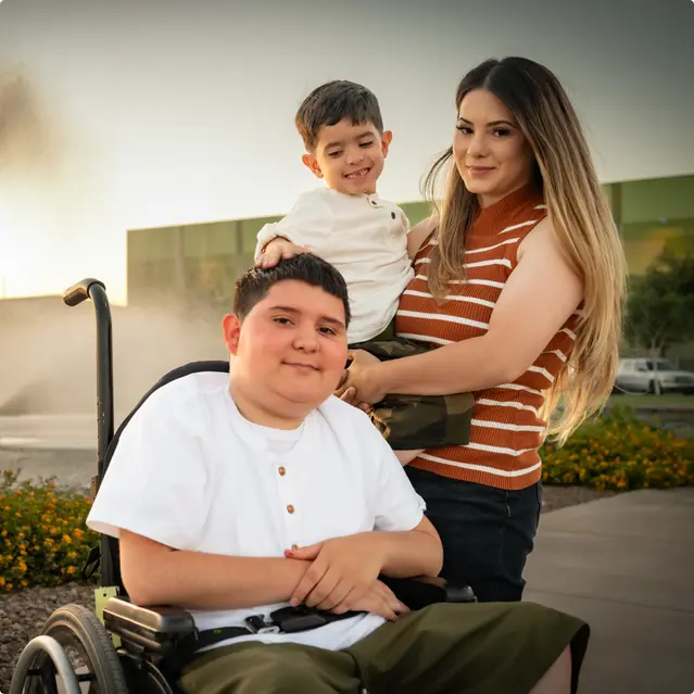 picture of JJ, Andrew, and their mother