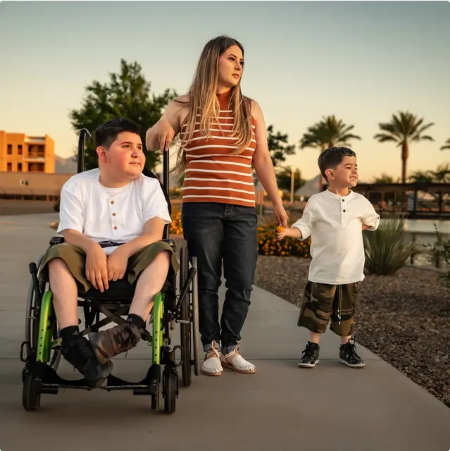 picture of JJ, Andrew, and their mother